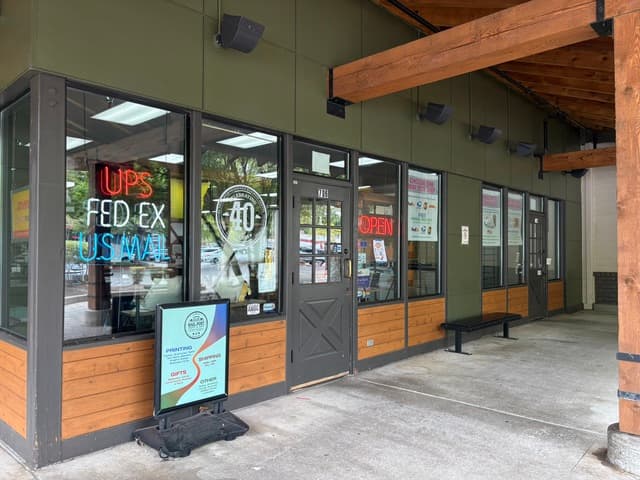 The Mail Post & Copies storefront, under the covered walkway next to Safeway